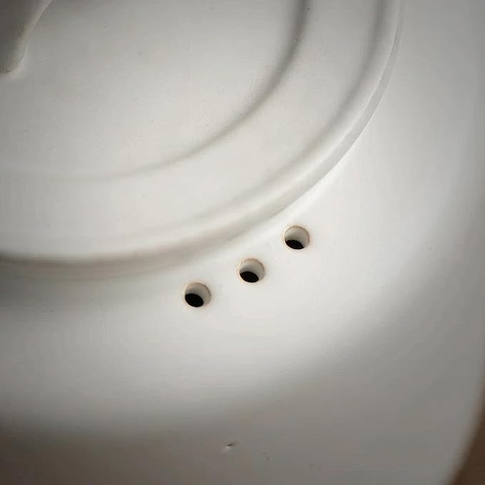 Small Stove Safe Ceramic Teapot with Cold Touch Curved Handle (27oz) - Hand-Glazed Finish - Suitable for Boiling Water and a Variety of Teas and Herbs - Matte Black-White