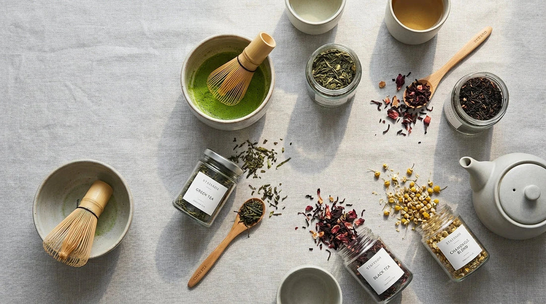 premium flat lay of assorted teas including matcha, green tea, black tea, and herbal blends