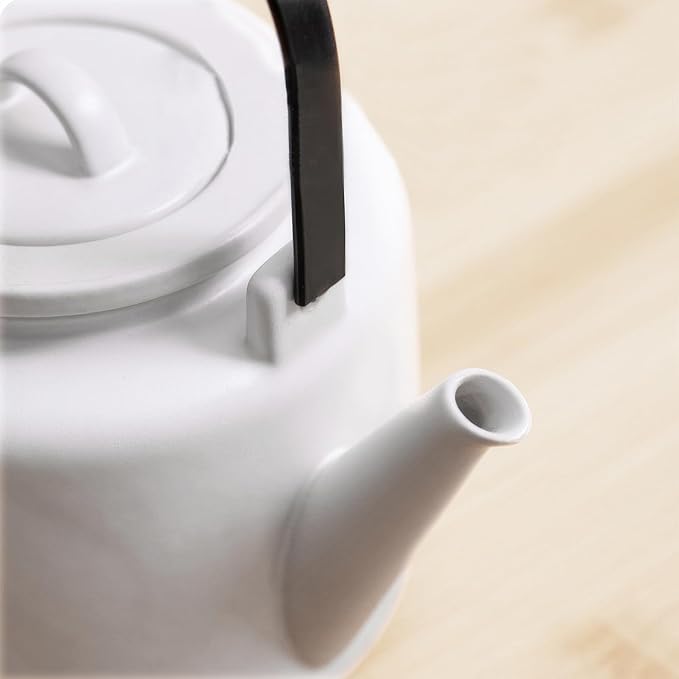 Small Stove Safe Ceramic Teapot with Cold Touch Curved Handle (27oz) - Hand-Glazed Finish - Suitable for Boiling Water and a Variety of Teas and Herbs - Matte Black-White