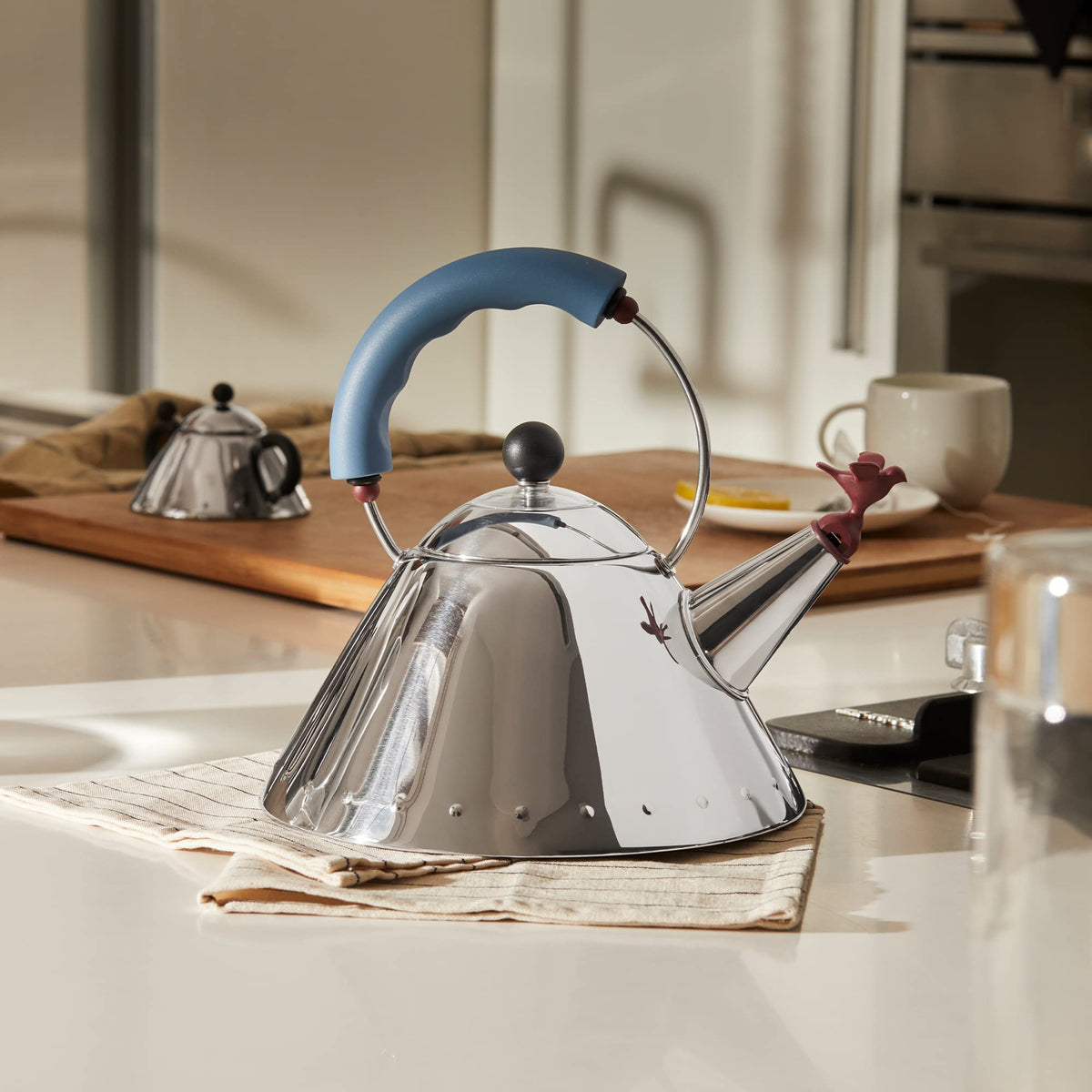 Alessi 9093 - Design Kettle with Handle and Bird-Shaped Whistle, Stainless Steel and PA, Light Blue