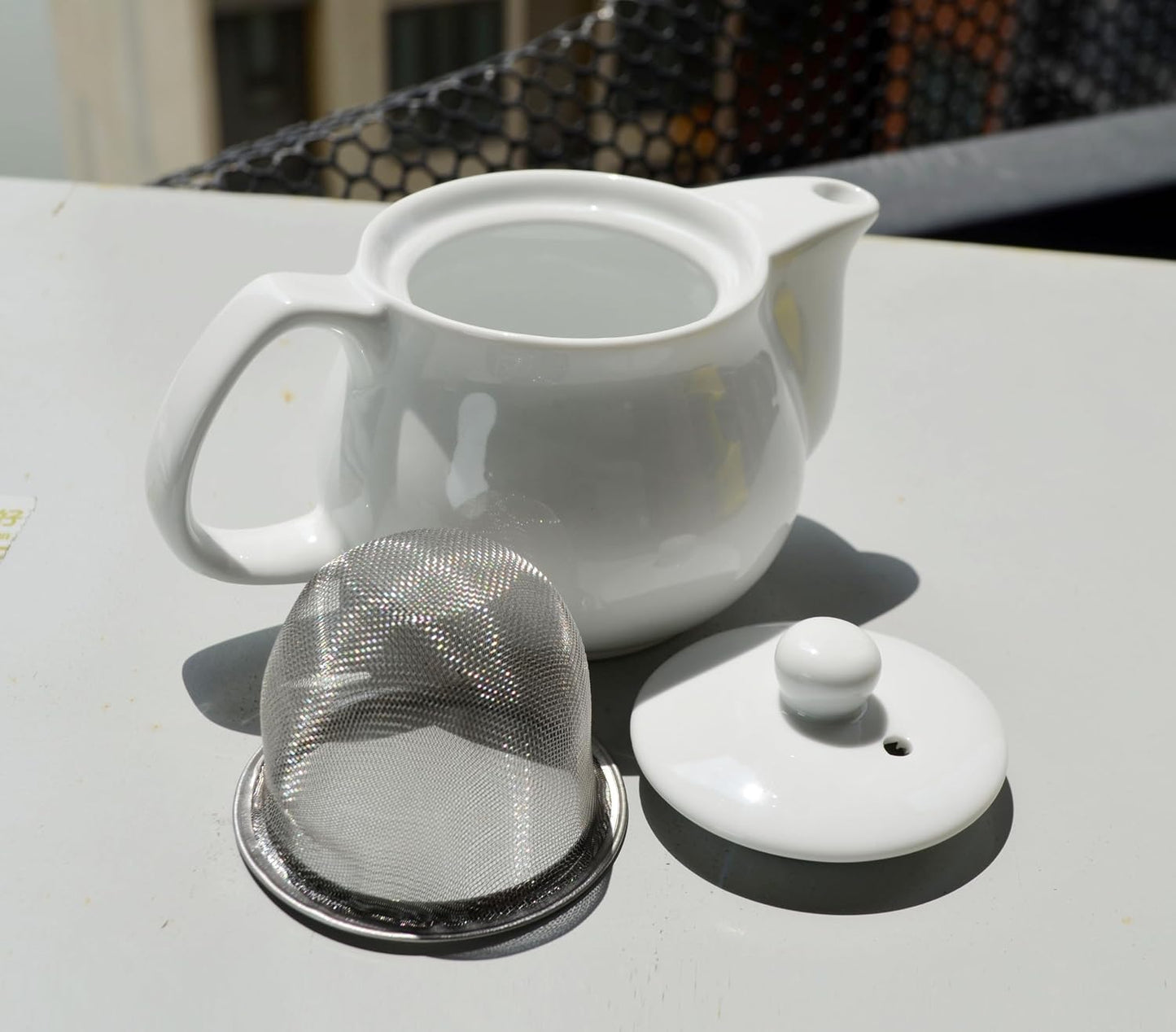 Porcelain Teapot ，9oz Small Ceramic Tea Pot with Infuser White Kettle