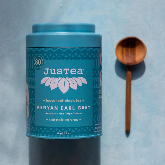 JusTea KENYAN EARL GREY Loose Black Tea, 40+ Cups Tin + Spoon, 4/5 Caffeine | Fair-Trade KENYAN EARL GREY Loose Leaf Black Tea. 90g/3.2oz Reusable Tin with a Hand-Carved Tea Spoon. 4/5 Caffeine. Organic.